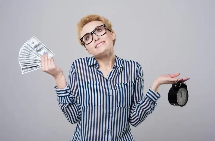 businesswoman holding money